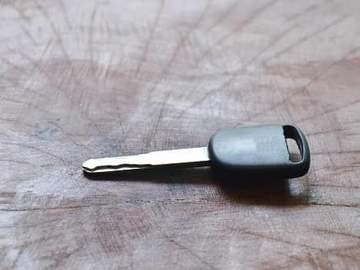 single car key on table
